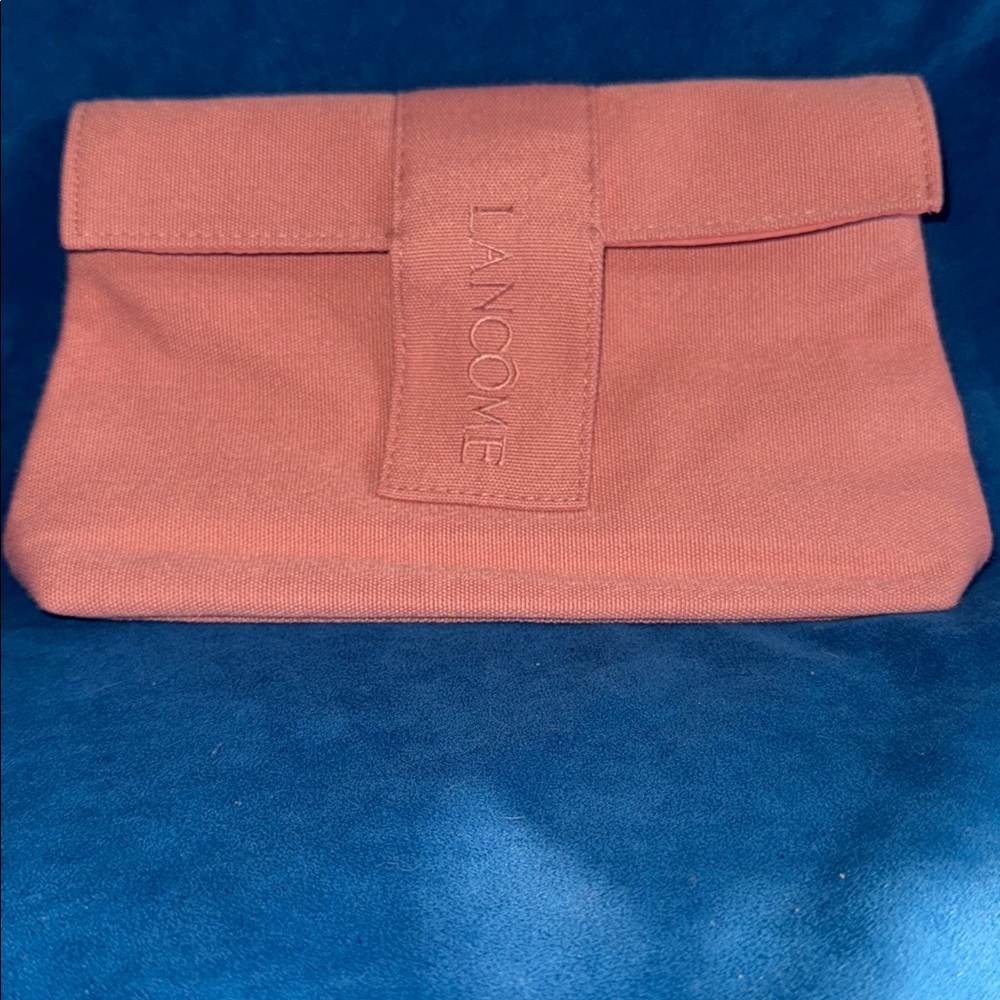 Lancome Dusty Rose Makeup Pouch never used. Made from recycled materials.